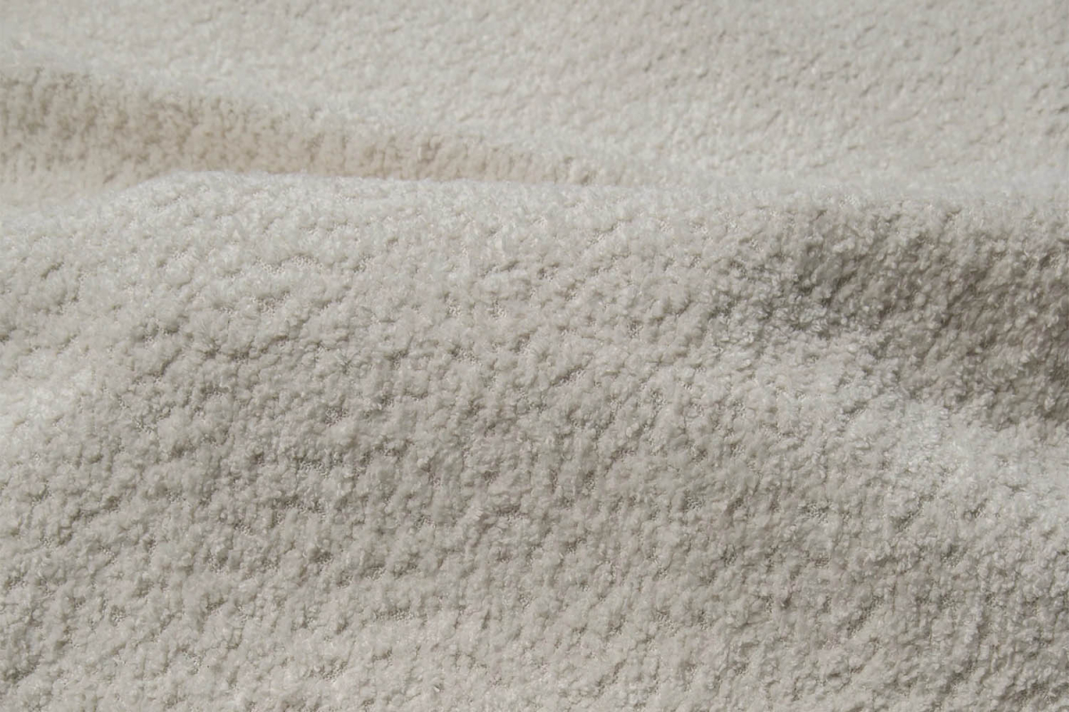 Canapé convertible Capri – Tissu bouclette ivoire